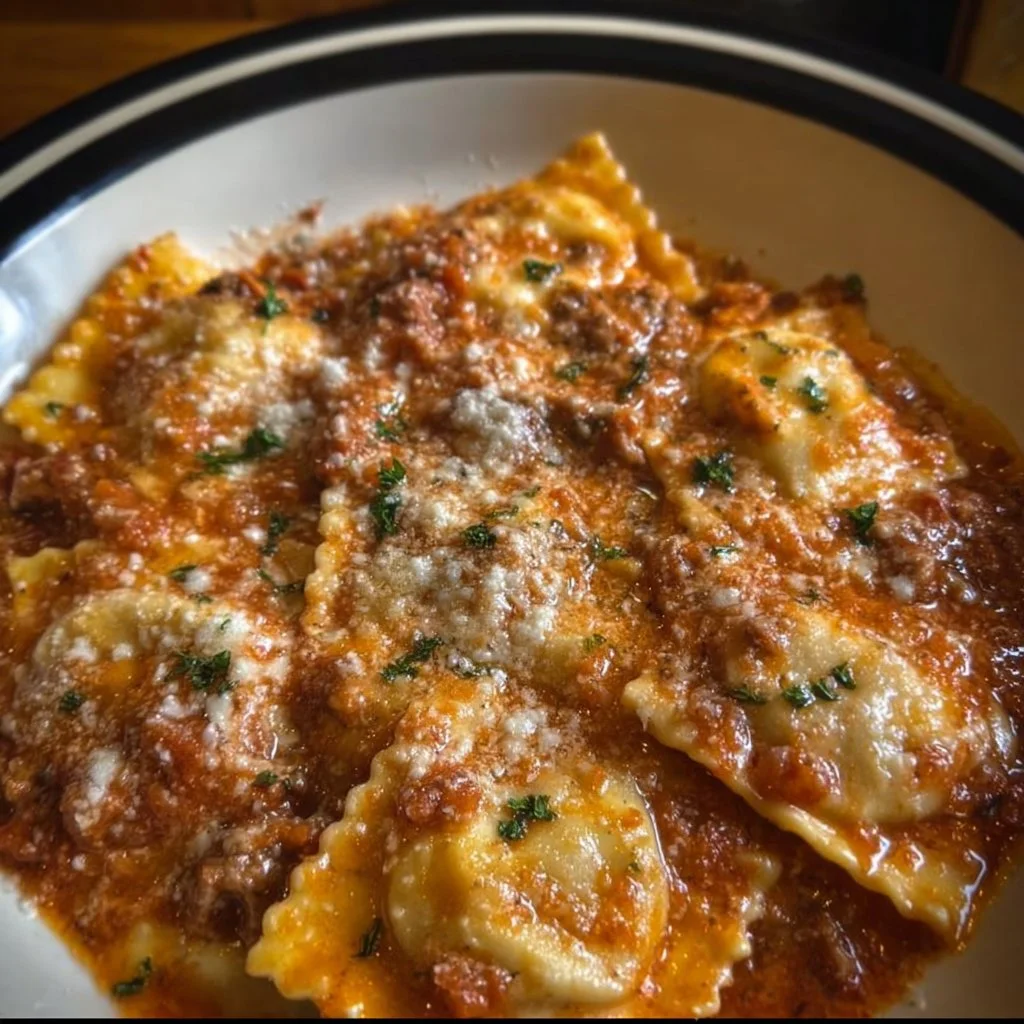 Crockpot Ravioli Lasagna: A Hands-Off, Flavor-Packed Comfort Food Masterpiece 1 Crockpot ravioli lasagna dish topped with melted cheese and fresh herbs