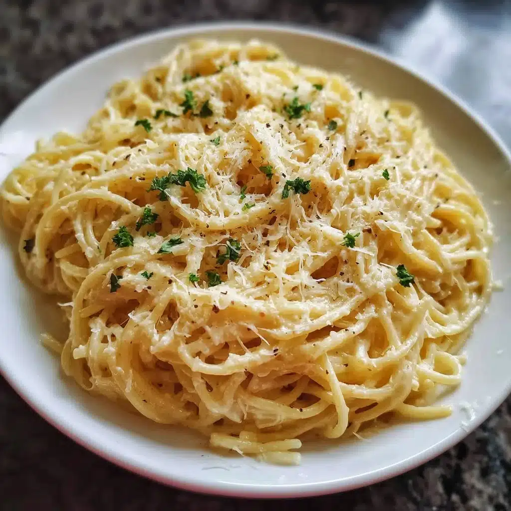 Delicious garlic parmesan spaghetti garnished with parsley