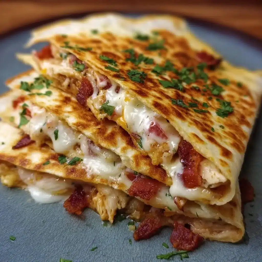Delicious Easy Chicken Bacon Ranch Quesadilla with crispy bacon and melted cheese