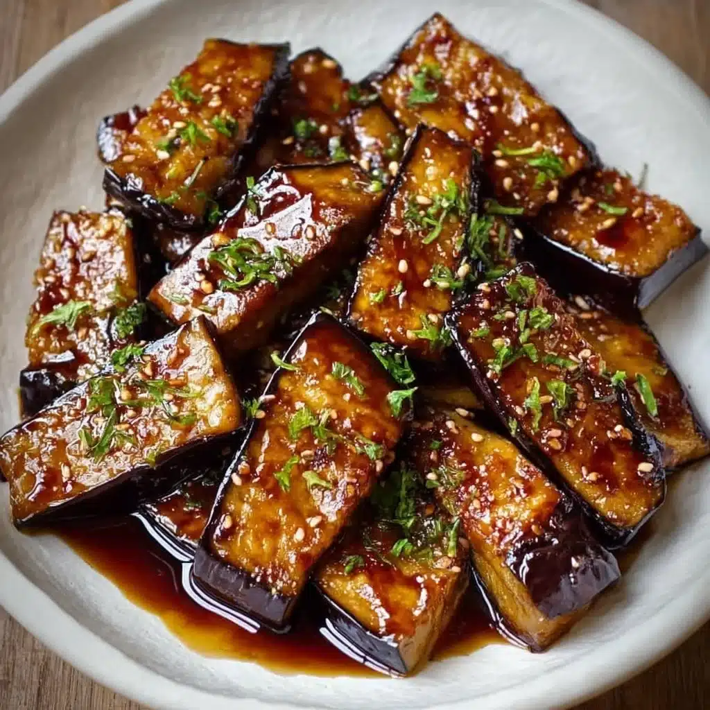 Miso glazed eggplant garnished with sesame seeds and green onions
