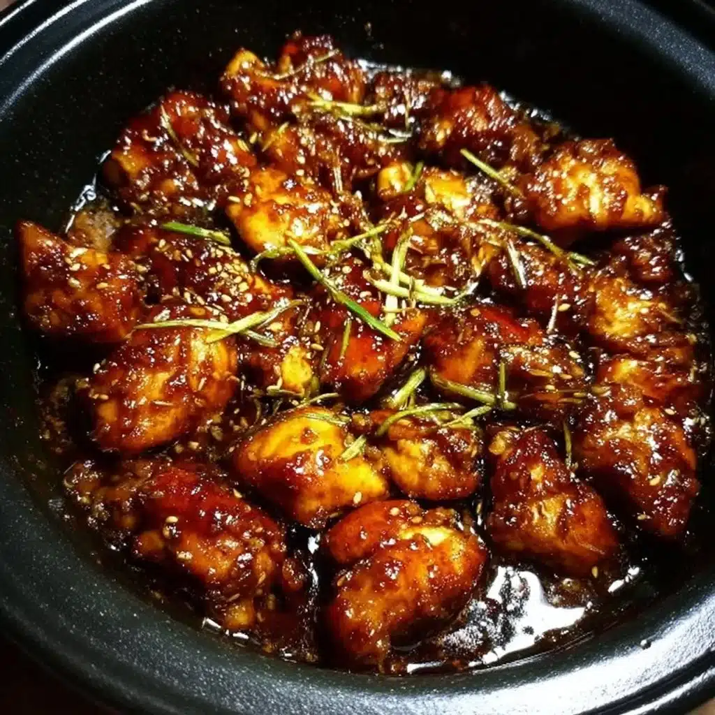 Delicious slow cooker honey garlic chicken served on a plate.