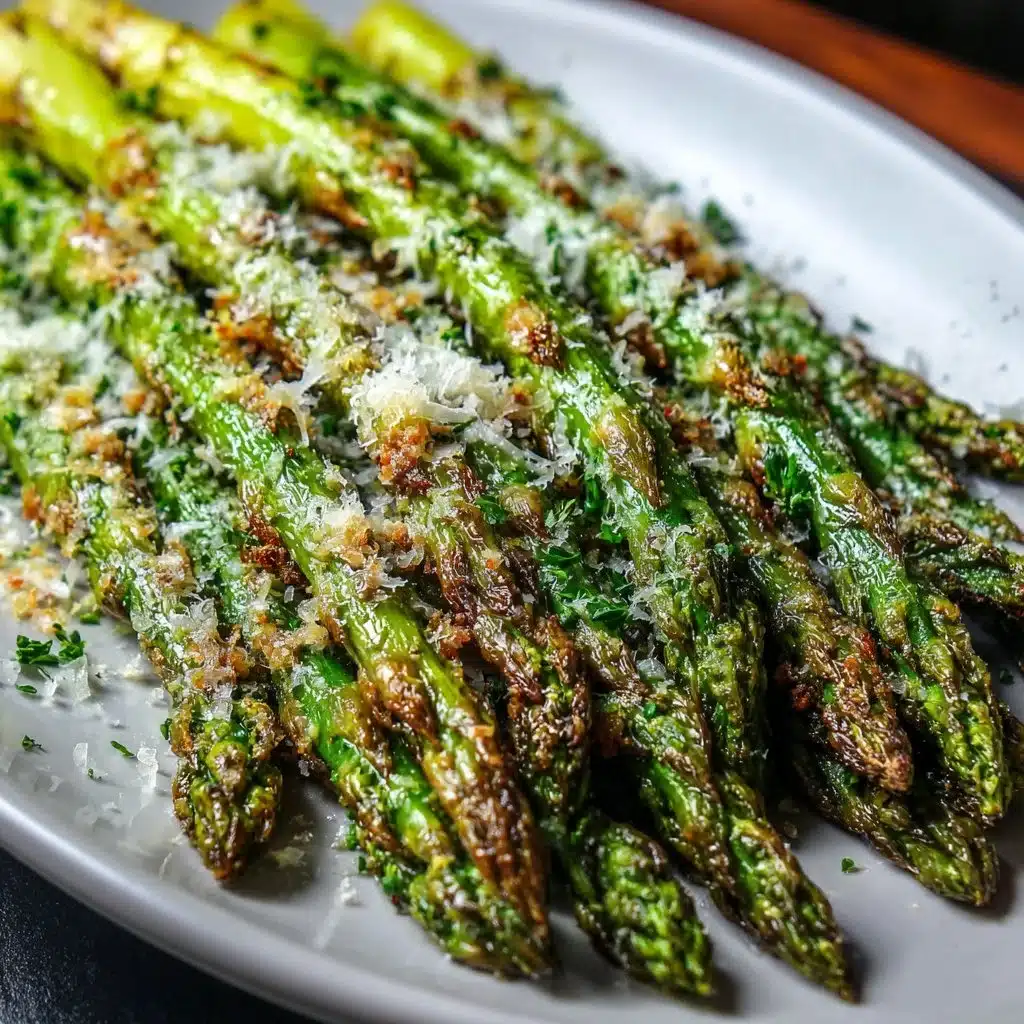 Oven-roasted Parmesan asparagus topped with cheese and herbs